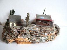 Huis 351230 Berg tafereel met 4 huisjes met licht