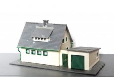 Huis 370779 Huisje met garage grijs dak