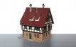 Huis 379860 Vakwerkhuis met houtstapels