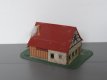 Huis 379935 Boerderijtje met stapel hout
