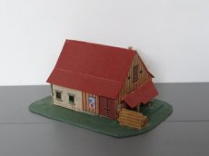 Huis 379935 Boerderijtje met stapel hout
