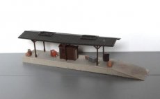 Huis 395013 Perron met attributen