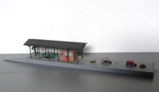 Huis 395014 Perron met attributen